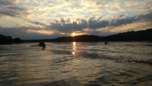 Rowing at sunset